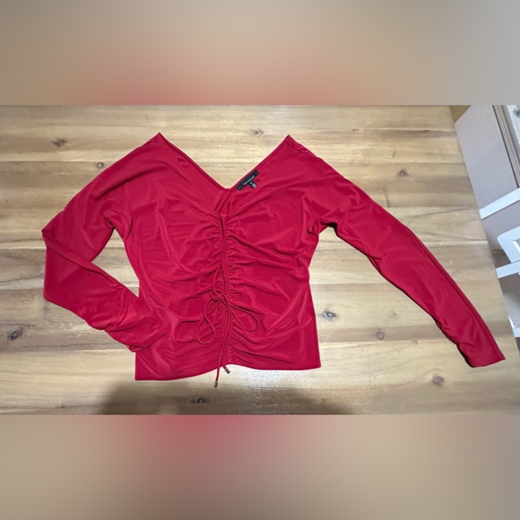 White House Black Market Tops - WHBM deep v neck and back. sexy long sleeve